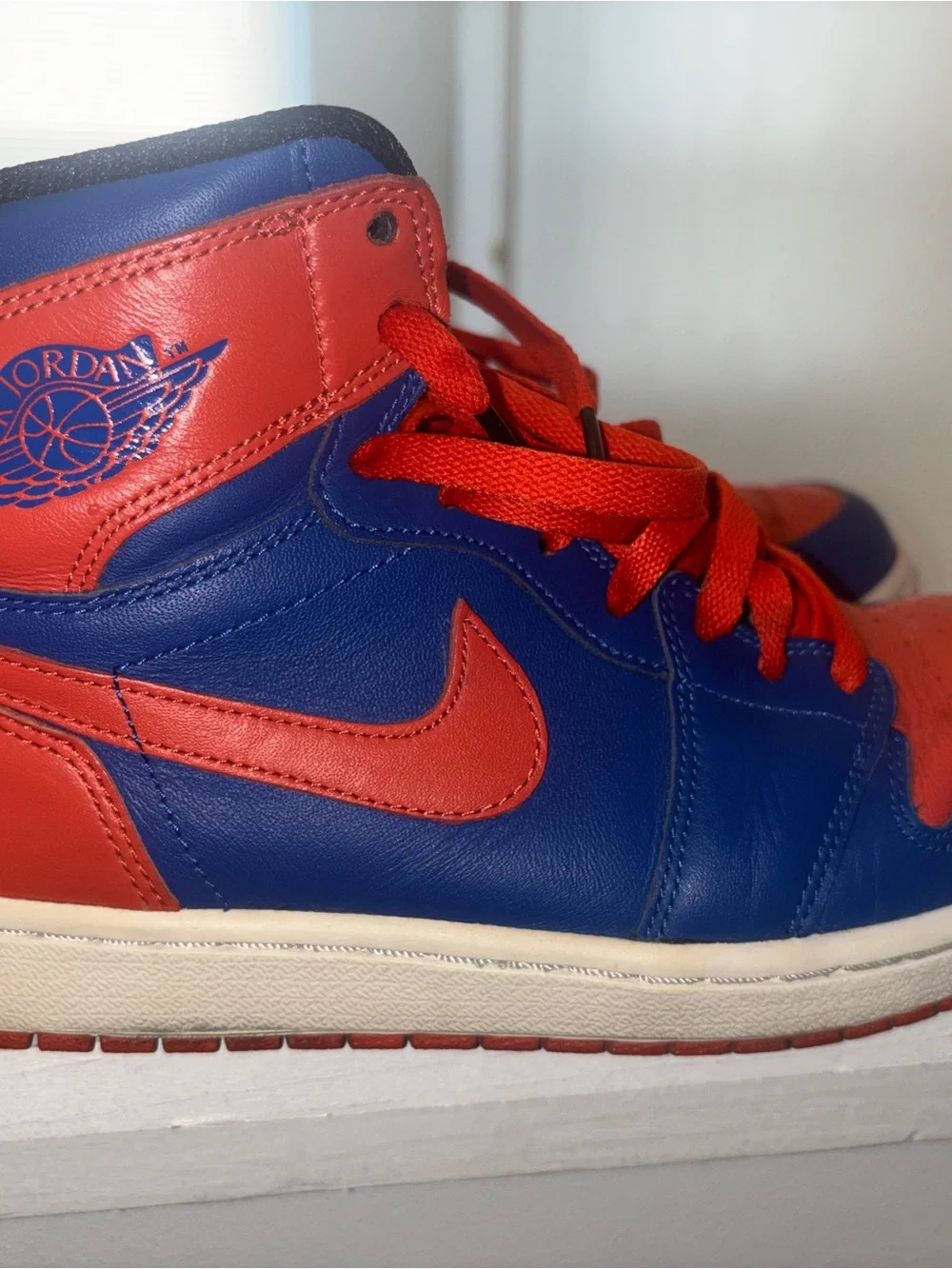 Nike Air Jordan OG High Knicks Men’s High-Top Athletic Shoes in Blue and Orange